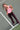 Model_holding_a_pink_Pulse_Pickleball_paddle_on_court_showcasing_stylish_pickleball_gear. - Pulse Pickleball