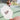 Pickleball_paddle_with_Pulse_branding_held_by_a_person_on_a_pickleball_court. - Pulse Pickleball