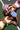 Two_women_lying_on_a_pickleball_court_holding_colourful_Pulse_Pickleball_paddles_above_their_heads_smiling_in_relaxed_stylish_activewear. - Pulse Pickleball